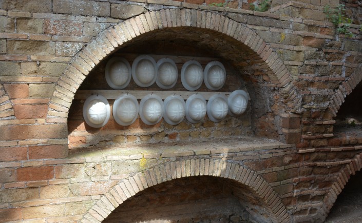 (Photo: protective hard hats for visitors of the Vigna Randanini catacombs)